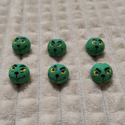 Grinch-Köpfchen 6er-Set – handbemalte Holzköpfe mit gelben Augen, 2 cm