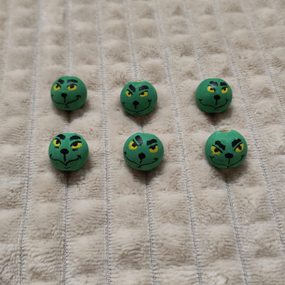 Grinch-Köpfchen 6er-Set – handbemalte Holzköpfe mit gelben Augen, 2 cm