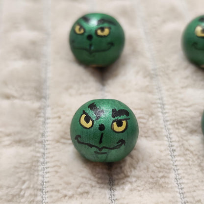 Grinch-Köpfchen 6er-Set – Metallic-Grün mit goldenen Augen, handbemalt, 2 cm