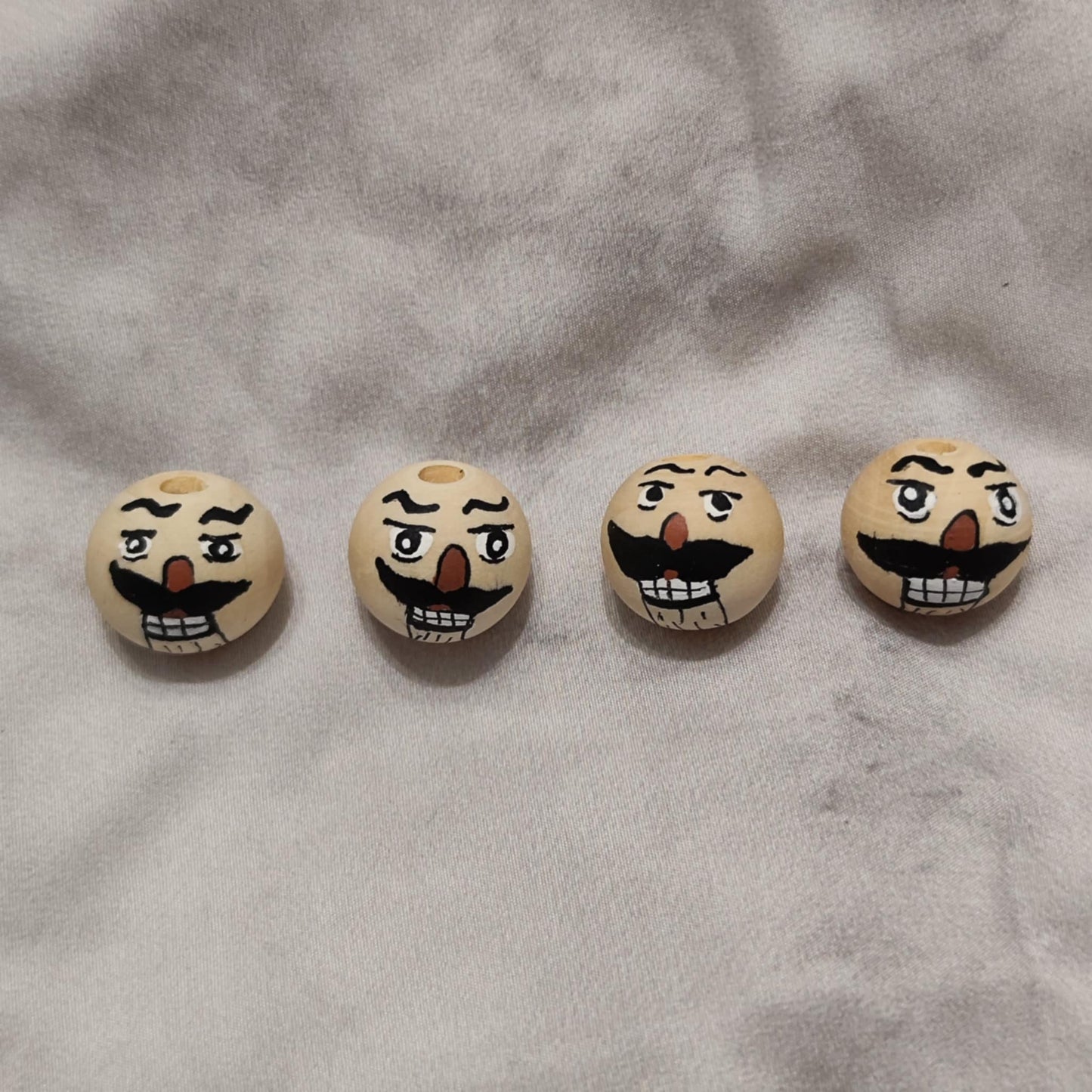 Nussknacker-Köpfchen – handbemalter Holzkopf mit Bart 2 cm