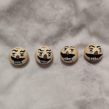 Nussknacker-Köpfchen – handbemalter Holzkopf mit Bart 2 cm