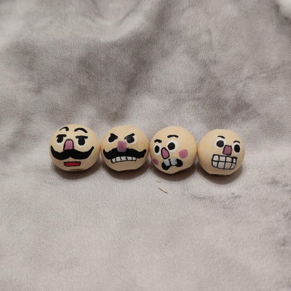 Nussknacker 4er-Set – handbemalte Holzköpfchen, einfache Version, 2 cm