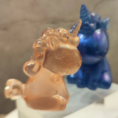 Magical unicorn duo made of epoxy resin